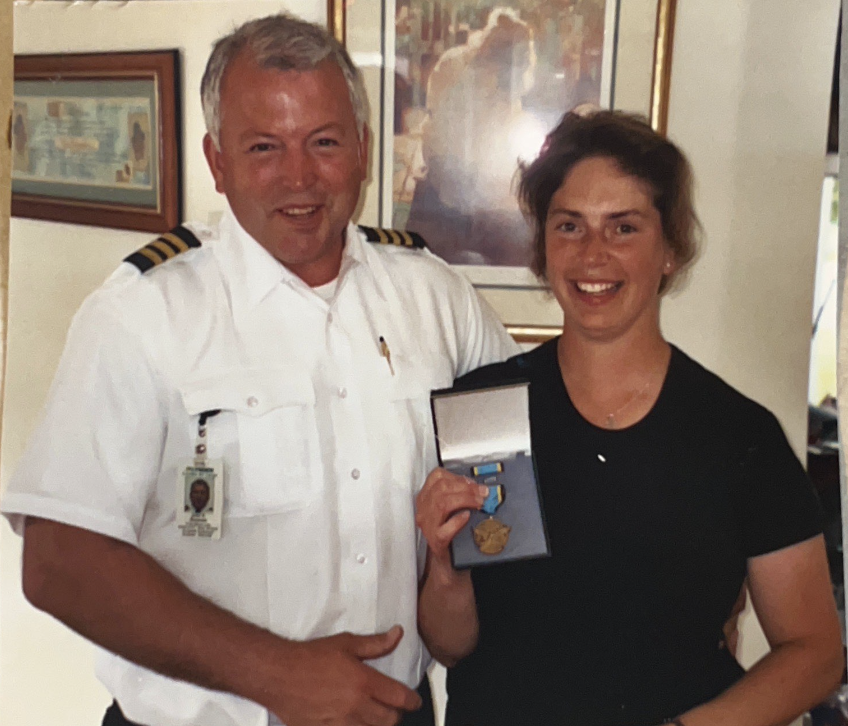 John receiving his medal